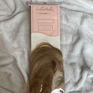 Premium synthetic clip in hair extension ponytail shade Cali blonde 18”